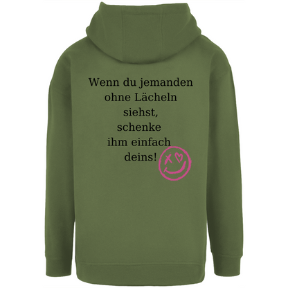 Unisex Oversize Hoodie "Wenn du jemand ohne lächeln siehst..."