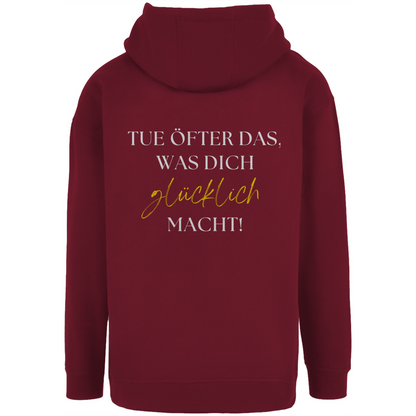 Unisex Oversize Hoodie "Tue öfter das was dich glücklich macht!"
