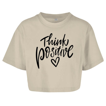 Damen Oversize Crop Top "Think Positive" - Grafikmagie
