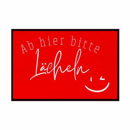 Fußmatte mit Gummirand "Ab hier bitte Lächeln" - Grafikmagie