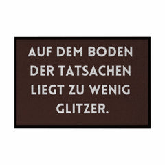 Fußmatte mit Gummirand "Auf dem Boden der Tatsachen liegt zu wenig Glitzer" - Grafikmagie
