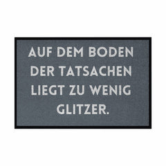 Fußmatte mit Gummirand "Auf dem Boden der Tatsachen liegt zu wenig Glitzer" - Grafikmagie