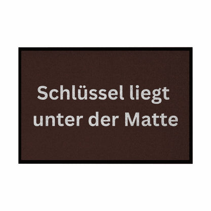 Fußmatte mit Gummirand "Schlüssel liegt unter der Matte" - Grafikmagie